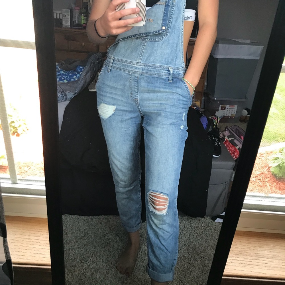 Distressed jean overalls